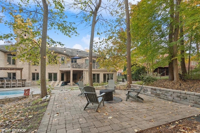 20662 Francisca Way, Frankfort, IL 60423 - view of patio / terrace featuring a balcony, fence, and an outdoor fire pit