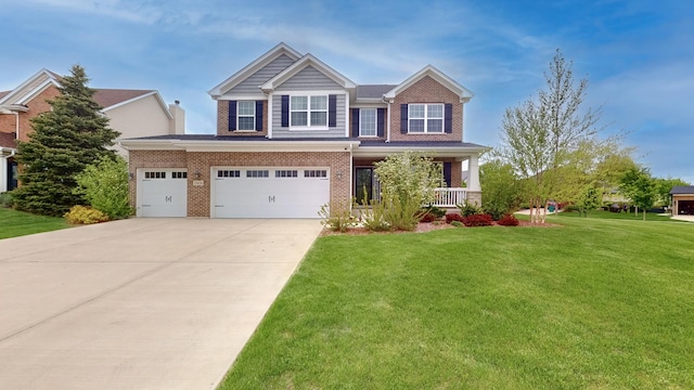 craftsman-style house with driveway, brick siding, a front yard, and a porch