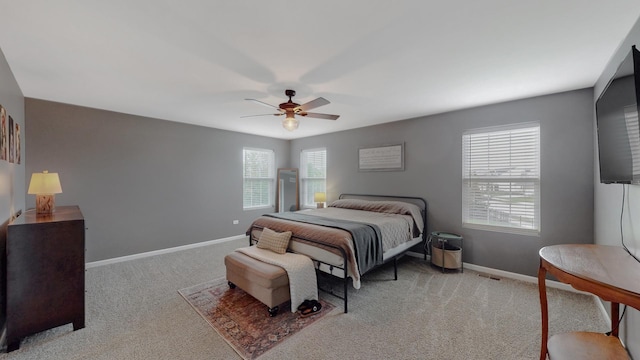 bedroom featuring carpet, baseboards, and ceiling fan