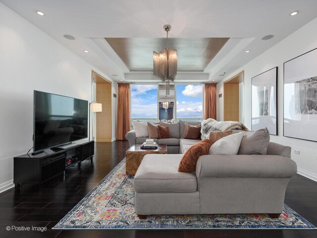 33 W Ontario St Unit 58E, Chicago, IL 60654 - living area featuring wood finished floors, a raised ceiling, a chandelier, baseboards, and recessed lighting
