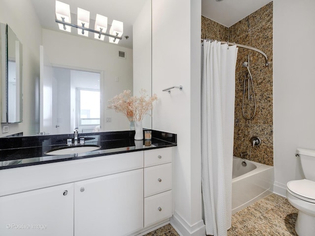 33 W Ontario St Unit 58E, Chicago, IL 60654 - full bath with toilet, vanity, shower / bath combo with shower curtain, and baseboards
