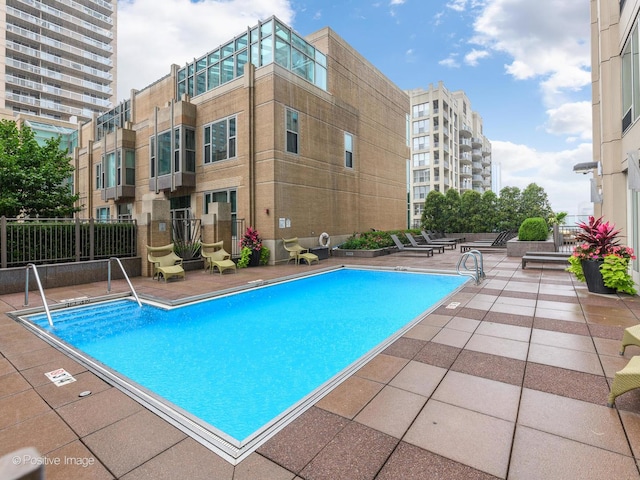 33 W Ontario St Unit 58E, Chicago, IL 60654 - community pool featuring a patio area and fence