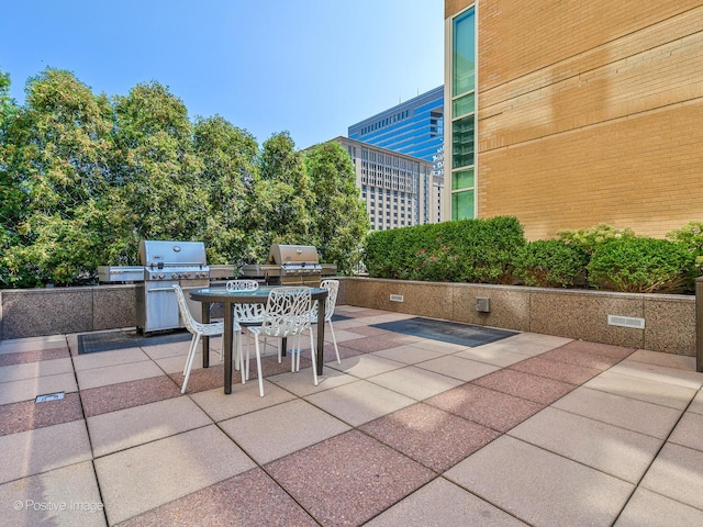 33 W Ontario St Unit 58E, Chicago, IL 60654 - view of patio with outdoor dining area and area for grilling