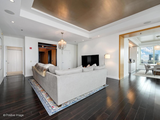 33 W Ontario St Unit 58E, Chicago, IL 60654 - living room with a raised ceiling, a chandelier, baseboards, dark wood-style flooring, and recessed lighting