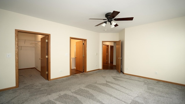 2620 Christie Dr, Algonquin, IL 60102 - unfurnished bedroom featuring a walk in closet, carpet, baseboards, and a closet