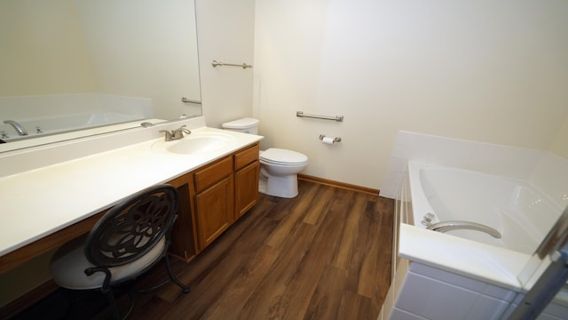 2620 Christie Dr, Algonquin, IL 60102 - bathroom featuring vanity, a bath, wood finished floors, toilet, and baseboards