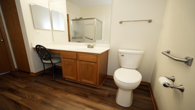 2620 Christie Dr, Algonquin, IL 60102 - bathroom featuring wood finished floors, a stall shower, toilet, and baseboards