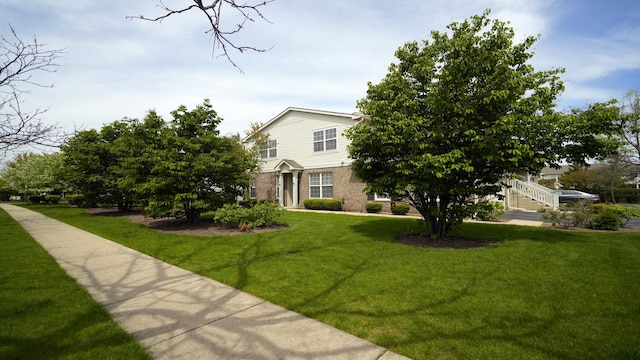 2620 Christie Dr, Algonquin, IL 60102 - view of property hidden behind natural elements with brick siding and a front lawn