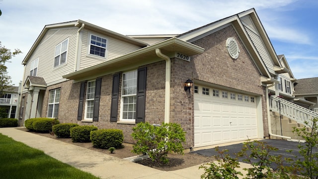 2620 Christie Dr, Algonquin, IL 60102 - view of property exterior with asphalt driveway and brick siding
