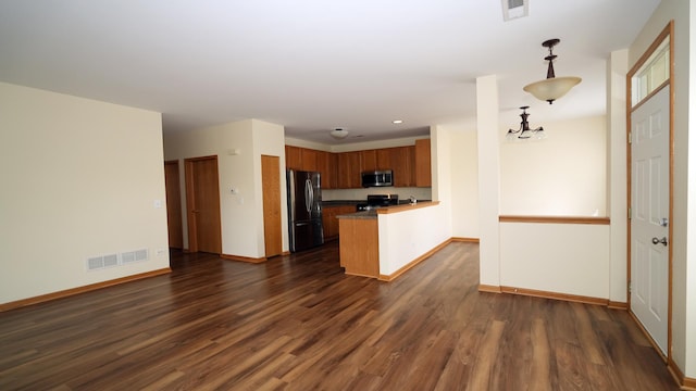 2620 Christie Dr, Algonquin, IL 60102 - kitchen with appliances with stainless steel finishes, dark wood-style floors, a peninsula, and baseboards
