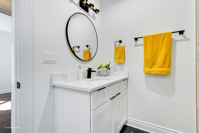 7317 S Maryland Ave, Chicago, IL 60619 - bathroom with vanity and baseboards