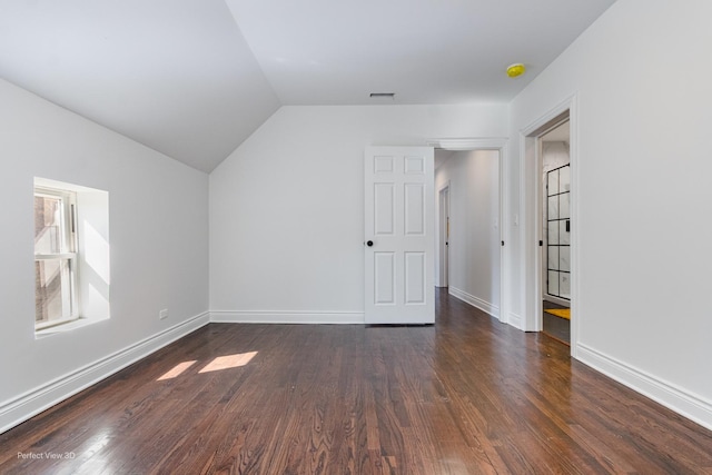 7317 S Maryland Ave, Chicago, IL 60619 - bonus room featuring vaulted ceiling, dark wood-type flooring, and baseboards