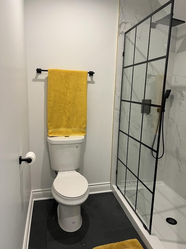 7317 S Maryland Ave, Chicago, IL 60619 - full bathroom featuring baseboards, a marble finish shower, and toilet
