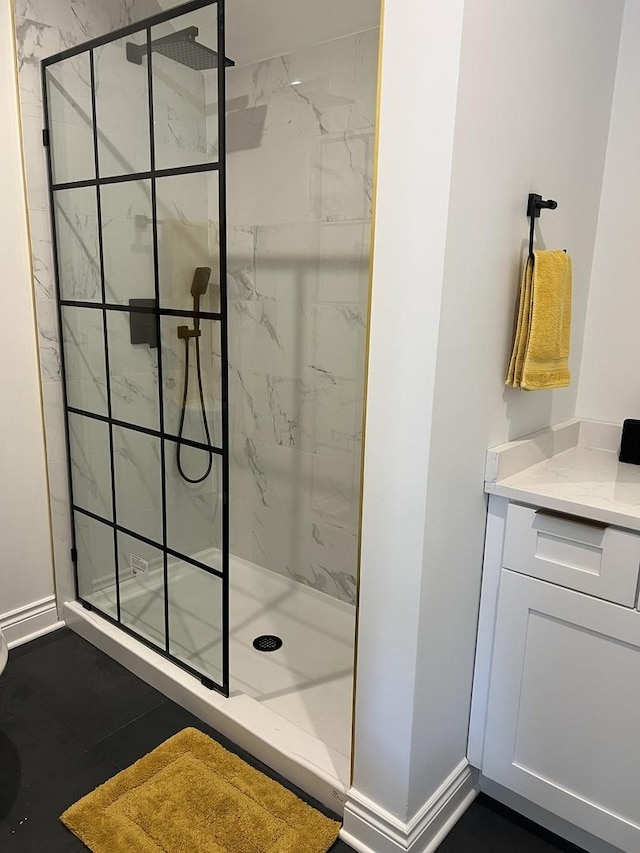 7317 S Maryland Ave, Chicago, IL 60619 - full bathroom featuring a stall shower and baseboards