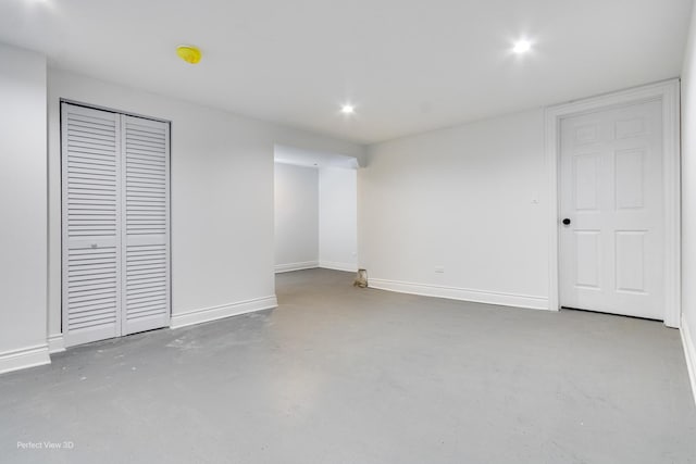 7317 S Maryland Ave, Chicago, IL 60619 - unfurnished bedroom featuring concrete flooring, baseboards, a closet, and recessed lighting