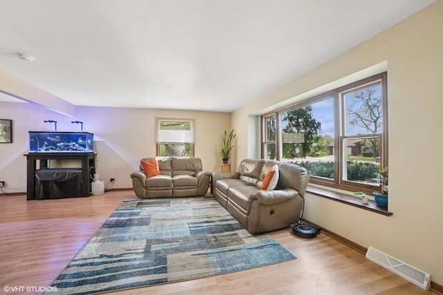 86 Brookside Dr, Elgin, IL 60123 - living room featuring wood finished floors and baseboards