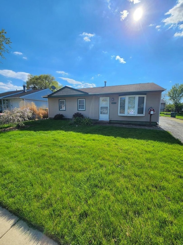 420 Garland Dr, Romeoville, IL 60446 - ranch-style house with a front lawn