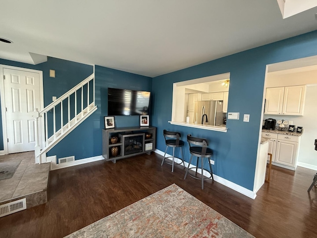 8223 170th St, Tinley Park, IL 60477 - living area with dark wood-style flooring, stairway, and baseboards