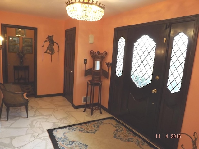 3550 Whirlaway Dr, Northbrook, IL 60062 - entryway featuring a chandelier and baseboards