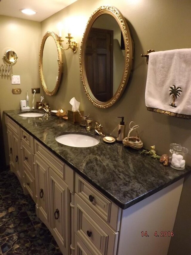 bathroom with double vanity