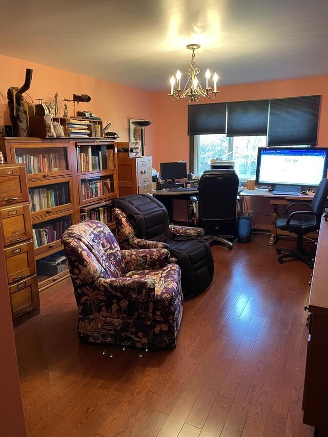 office featuring hardwood / wood-style floors and a chandelier