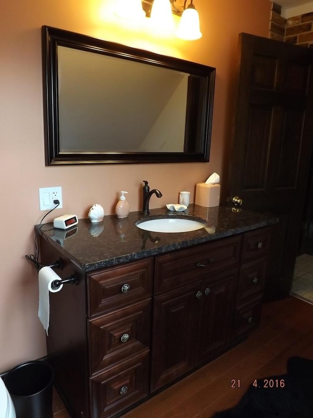 3550 Whirlaway Dr, Northbrook, IL 60062 - bathroom with vanity and wood finished floors