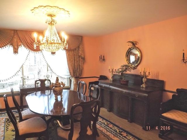 3550 Whirlaway Dr, Northbrook, IL 60062 - dining area featuring a chandelier and wood finished floors
