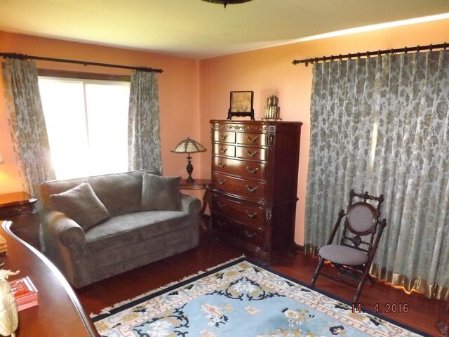 living room with wood finished floors