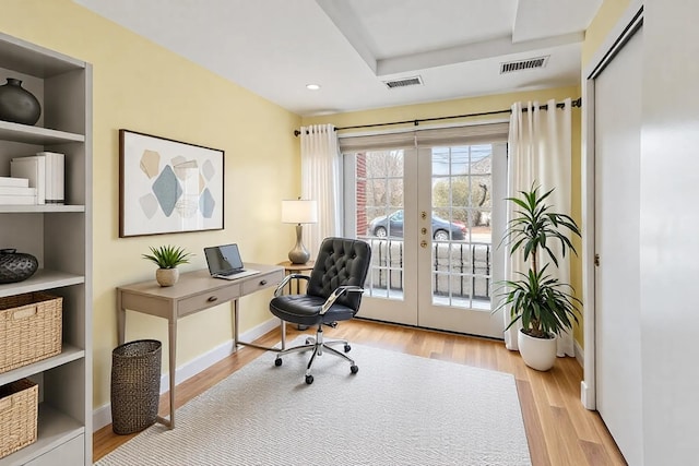 1747 N Fern Ct, Chicago, IL 60614 - home office with french doors, wood finished floors, recessed lighting, and baseboards