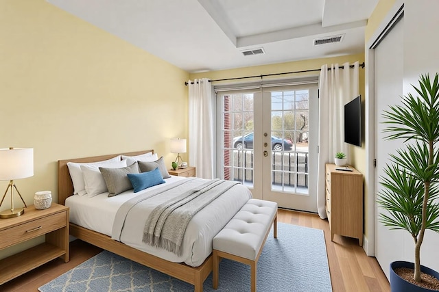 1747 N Fern Ct, Chicago, IL 60614 - bedroom with access to exterior, french doors, and light wood-style flooring