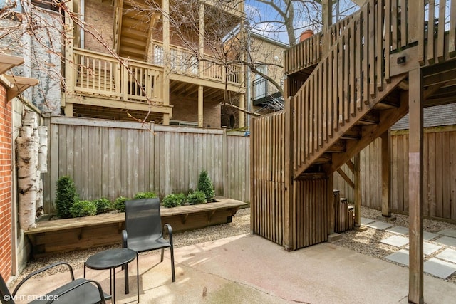1747 N Fern Ct, Chicago, IL 60614 - view of patio with a fenced backyard and stairs