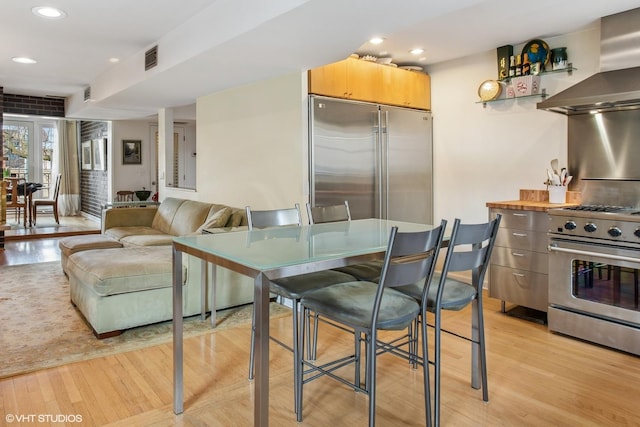 1747 N Fern Ct, Chicago, IL 60614 - dining room with light wood-style floors and recessed lighting