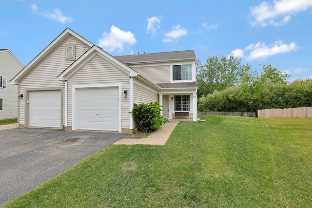 17 Ronan Ct, Lake In The Hills, IL 60156 - traditional-style house with asphalt driveway and an attached garage