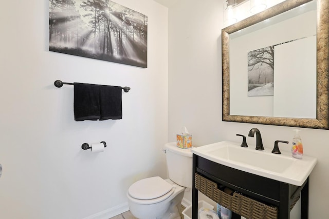 17 Ronan Ct, Lake In The Hills, IL 60156 - half bathroom with toilet, vanity, and baseboards
