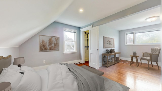 666 Greenview Ave, Des Plaines, IL 60016 - bedroom featuring wood finished floors, lofted ceiling, baseboards, and recessed lighting