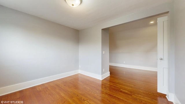 666 Greenview Ave, Des Plaines, IL 60016 - spare room featuring wood finished floors and baseboards