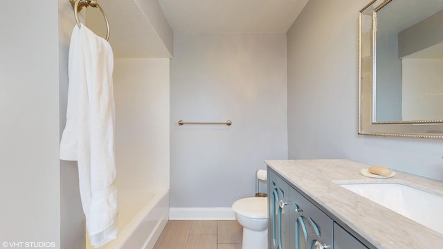 666 Greenview Ave, Des Plaines, IL 60016 - bathroom with toilet, vanity, baseboards, and tile patterned floors