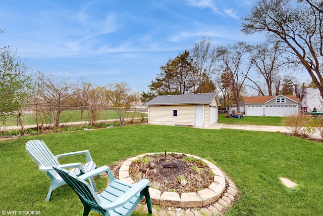 666 Greenview Ave, Des Plaines, IL 60016 - view of yard featuring an outbuilding and a detached garage