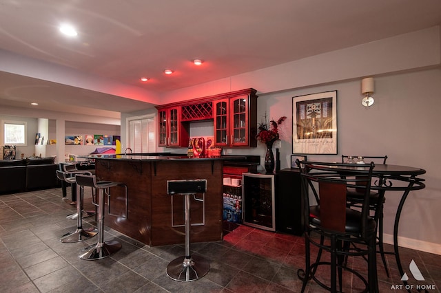 3713 Ballantrae Way, Flossmoor, IL 60422 - indoor wet bar with dark tile patterned floors, wine cooler, and recessed lighting