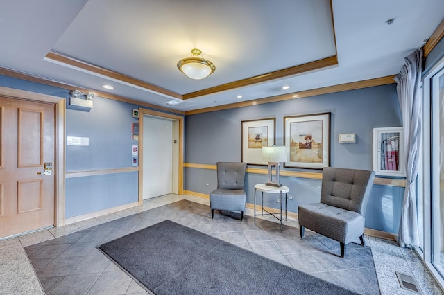 lobby featuring crown molding and recessed lighting