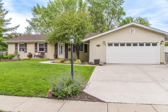 985 W Firestone Dr, Hoffman Estates, IL 60192 - ranch-style home with driveway, a front lawn, an attached garage, and brick siding