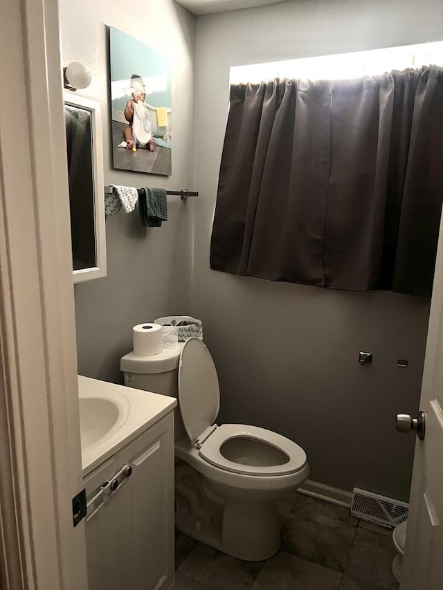 10014 S Aberdeen St, Chicago, IL 60643 - half bathroom featuring toilet, tile patterned floors, and vanity