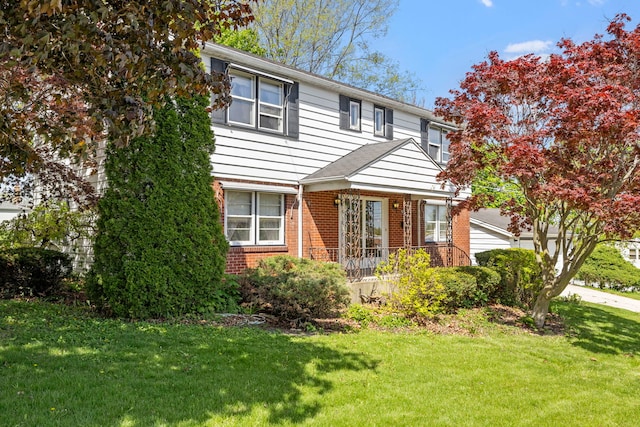 428 Julia St, Lemont, IL 60439 - view of front of home with brick siding and a front lawn