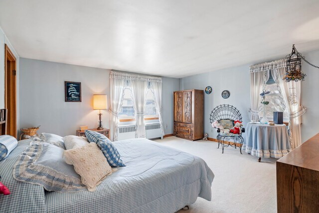 428 Julia St, Lemont, IL 60439 - bedroom featuring radiator heating unit, carpet floors, and baseboards