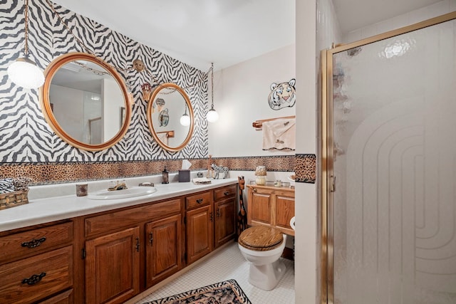 428 Julia St, Lemont, IL 60439 - full bathroom with wallpapered walls, tile patterned floors, a shower stall, double vanity, and toilet