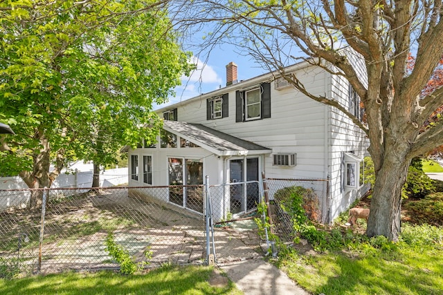 428 Julia St, Lemont, IL 60439 - view of front of house featuring a chimney and a gate