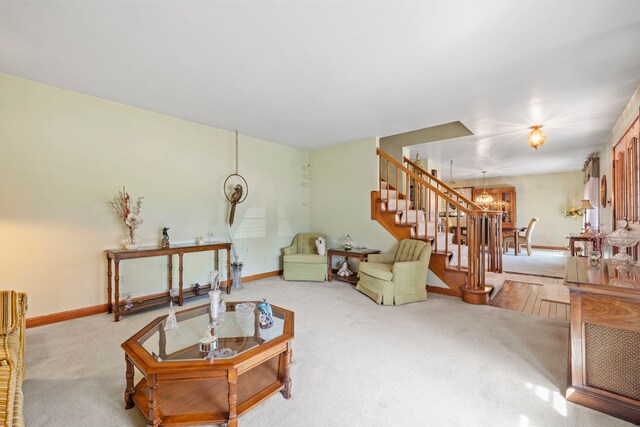 428 Julia St, Lemont, IL 60439 - living room featuring stairway, carpet, a chandelier, and baseboards
