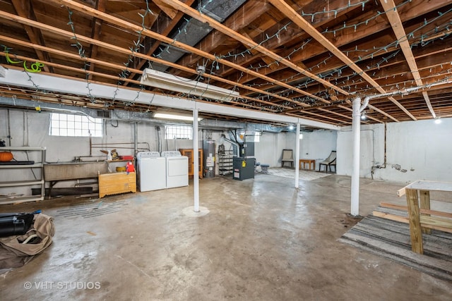 6119 S Melvina Ave, Chicago, IL 60638 - basement featuring washer and clothes dryer, gas water heater, and heating unit