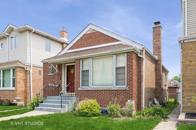 6119 S Melvina Ave, Chicago, IL 60638 - view of front of house with a chimney and brick siding
