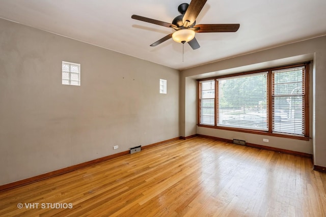 6119 S Melvina Ave, Chicago, IL 60638 - spare room featuring ceiling fan and light wood-style flooring